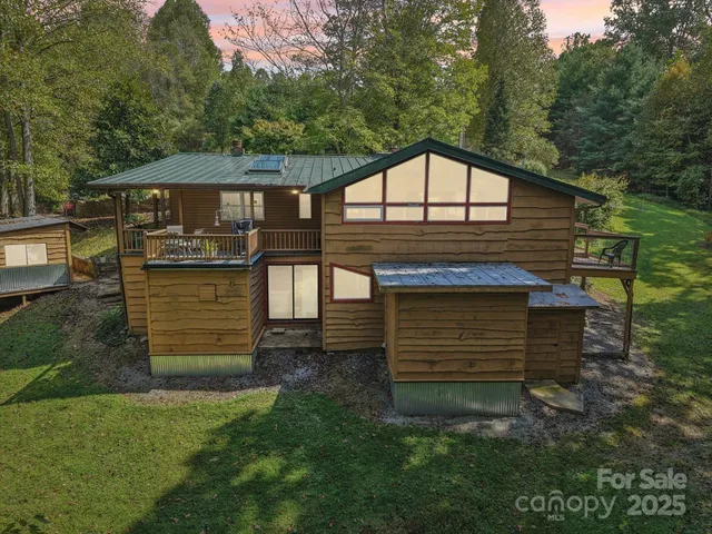 a bedroom with furniture and a chandelier