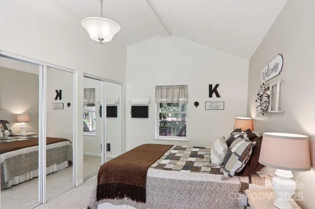 a living room with lots of furniture and a book shelf