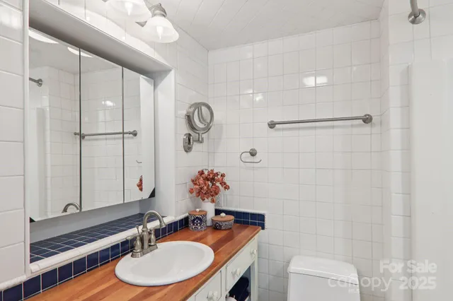 a bed room with a bed and a large window