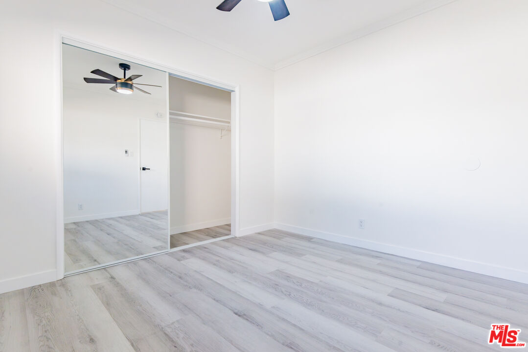 2107 Pullman Lane, Unit D Redondo Beach, CA 90278 - Photo 13 of 32 an empty room with a closet