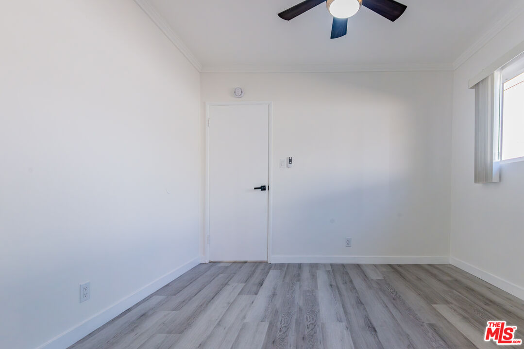 2107 Pullman Lane, Unit D Redondo Beach, CA 90278 - Photo 27 of 32 wooden floor in an empty room
