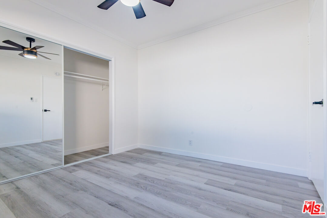 2107 Pullman Lane, Unit D Redondo Beach, CA 90278 - Photo 29 of 32 wooden floor in an empty room