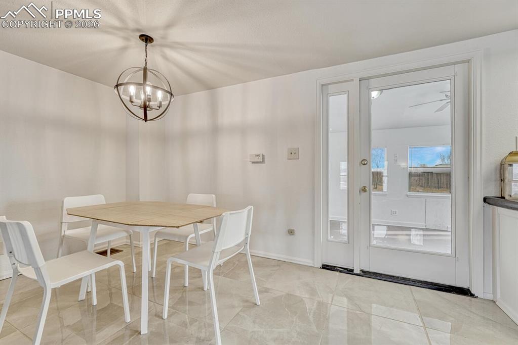 7815 Maverick Road Colorado Springs, CO 80908 - Photo 12 of 41 ceramic tile dining area