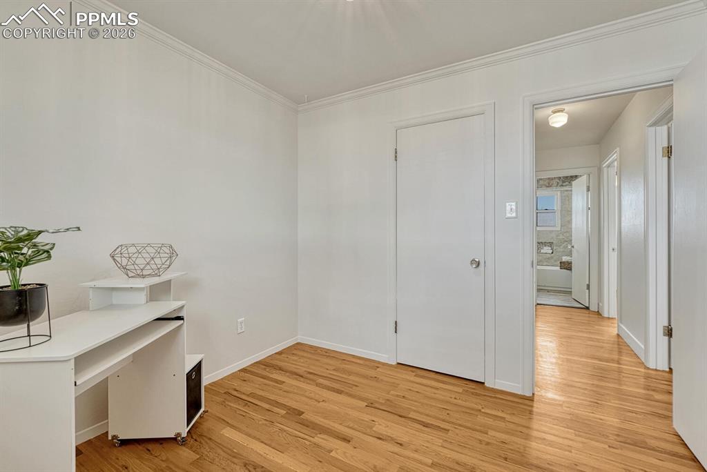 7815 Maverick Road Colorado Springs, CO 80908 - Photo 23 of 41 Bedroom 3 with walk-in closet. Also faces west