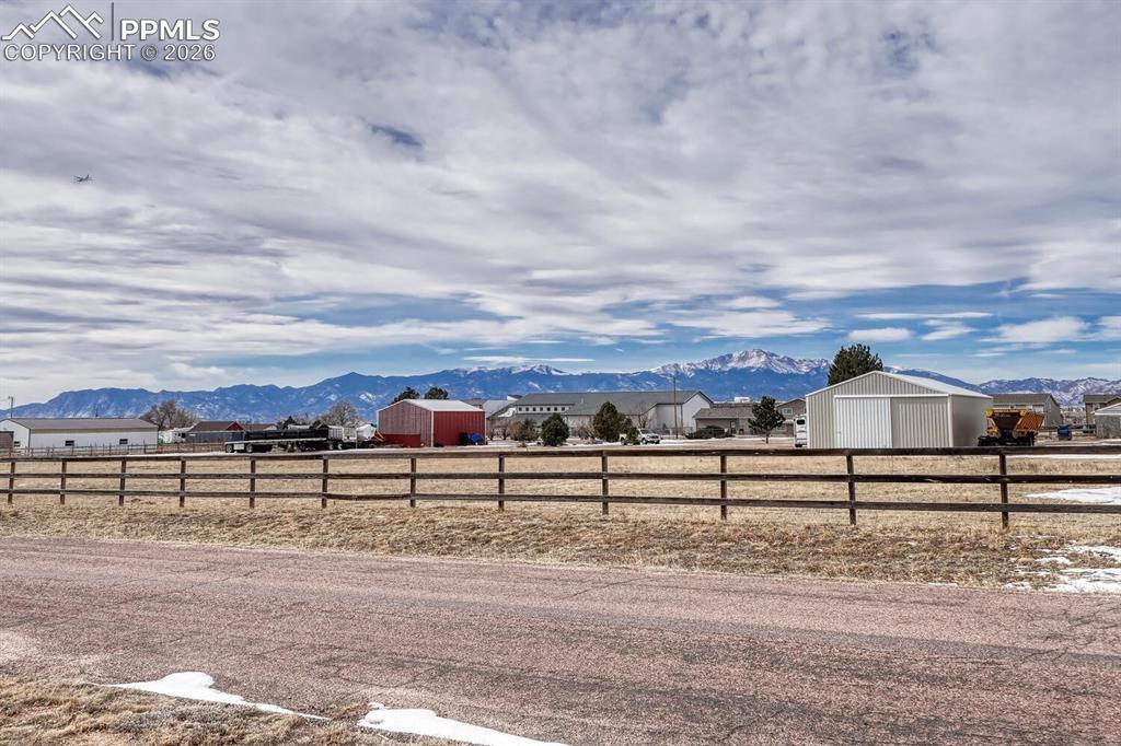 7815 Maverick Road Colorado Springs, CO 80908 - Photo 35 of 41 Front of the house with sweeping front range views and perfect Pikes Peak views!