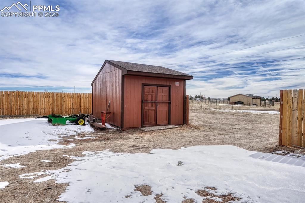 7815 Maverick Road Colorado Springs, CO 80908 - Photo 38 of 41 second storage shed, gate from fence.