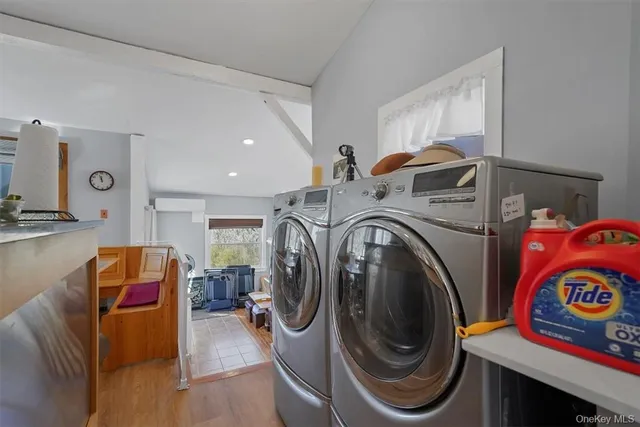 a utility room with dryer and washer