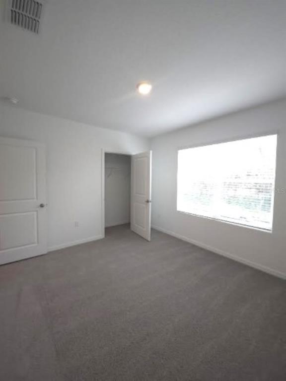 35589 Lockman Way Zephyrhills, FL 33541 - Photo 38 of 54 an empty room with a window