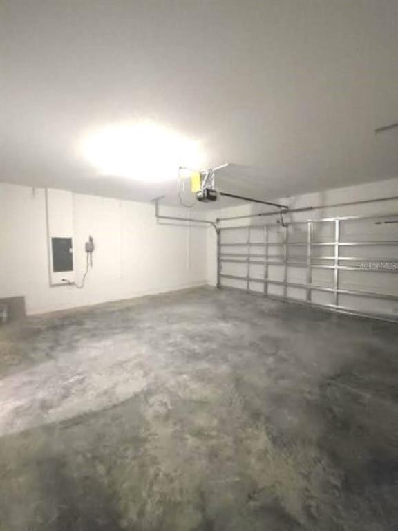 35589 Lockman Way Zephyrhills, FL 33541 - Photo 45 of 54 a view of a room with racks on the wall