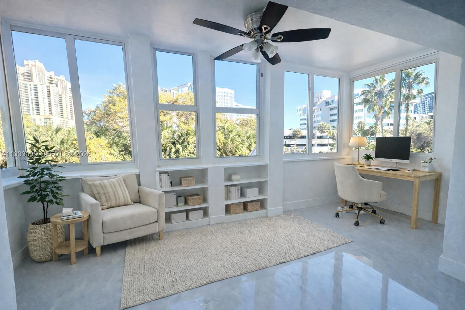9159 Southwest 77th Avenue, Unit 314 Miami, FL 33156 - Photo 1 of 53 a view of a livingroom with furniture and a window