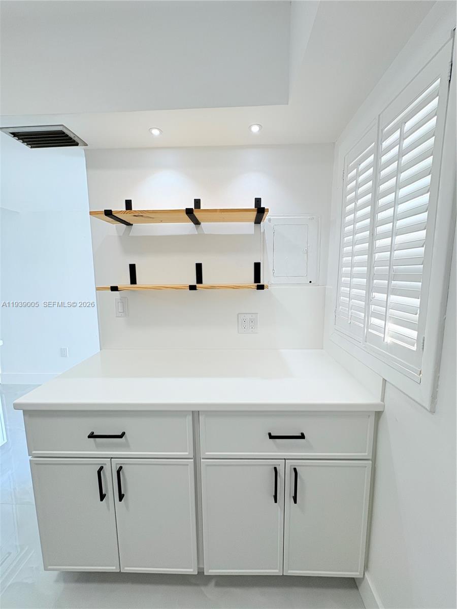 9159 Southwest 77th Avenue, Unit 314 Miami, FL 33156 - Photo 19 of 53 a view of cabinets
