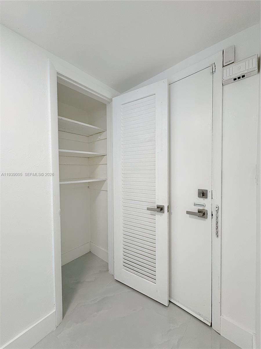 9159 Southwest 77th Avenue, Unit 314 Miami, FL 33156 - Photo 27 of 53 a view of an empty room