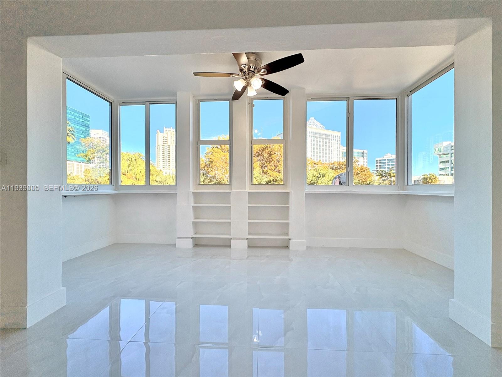 9159 Southwest 77th Avenue, Unit 314 Miami, FL 33156 - Photo 10 of 53 a view of an empty room with a window