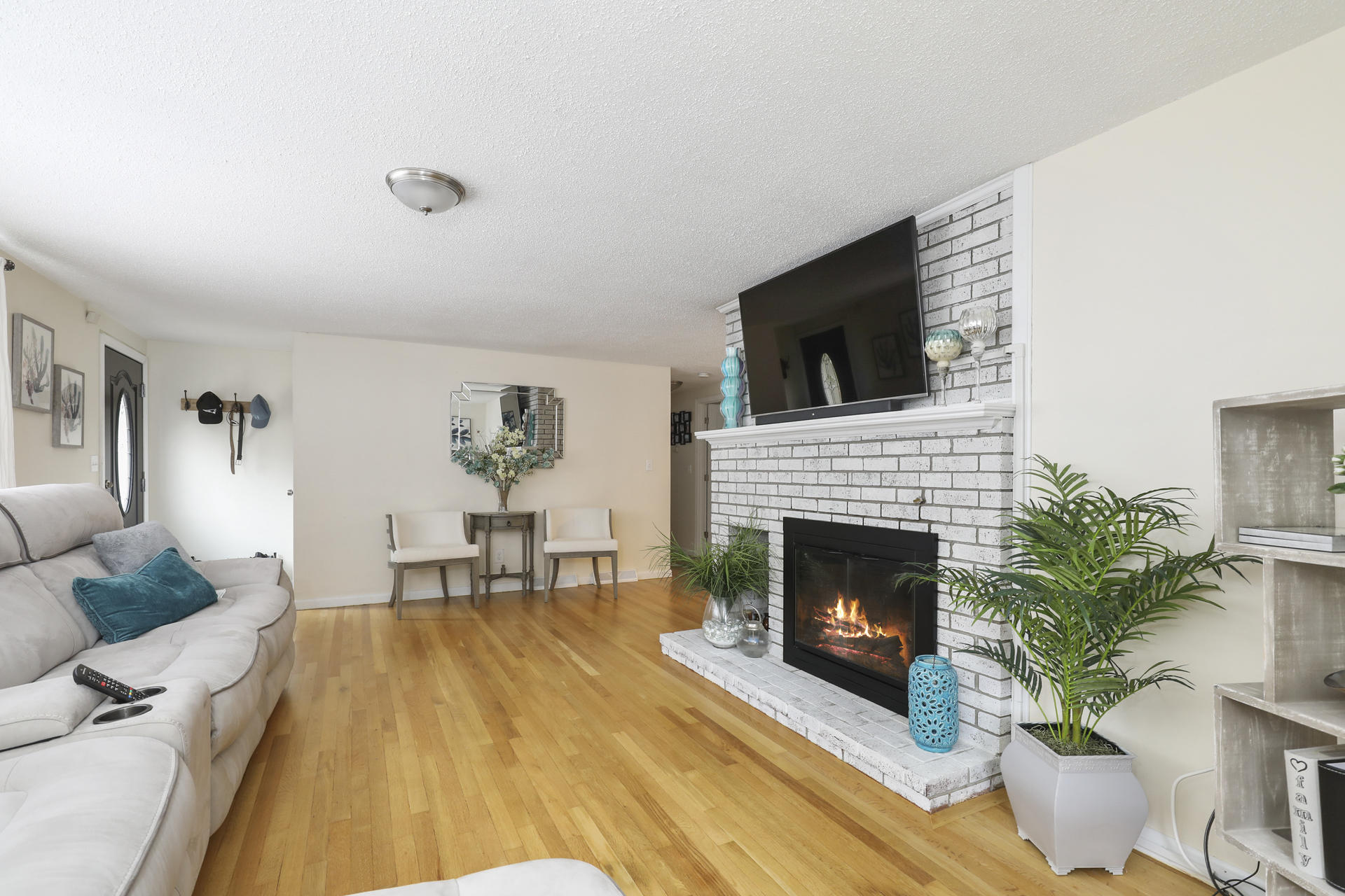 236 Megan Road Hyannis, MA 02601 - Photo 4 of 20 a living room with furniture and a fireplace