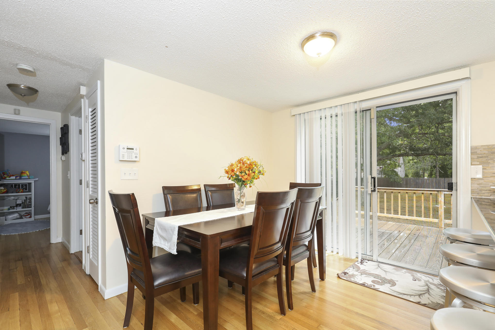 236 Megan Road Hyannis, MA 02601 - Photo 5 of 20 a view of a dining room with furniture and wooden floor
