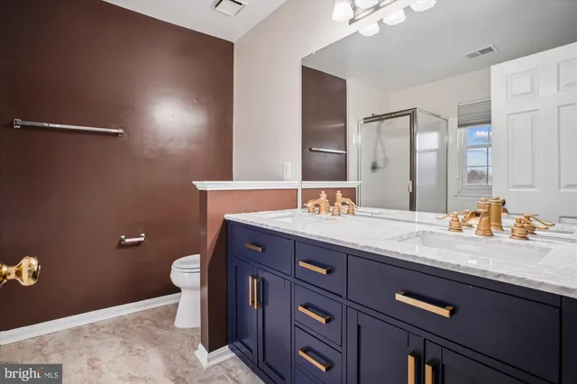 a bathroom with a tub and shower