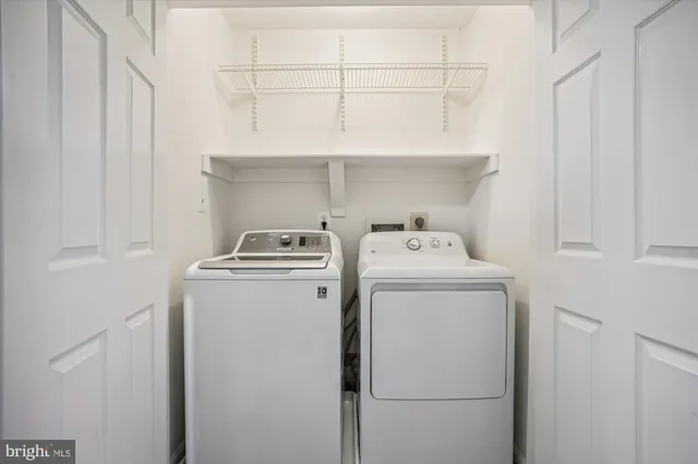 a view of an empty room with stairs