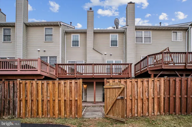 a view of a swimming pool with a lounge chair