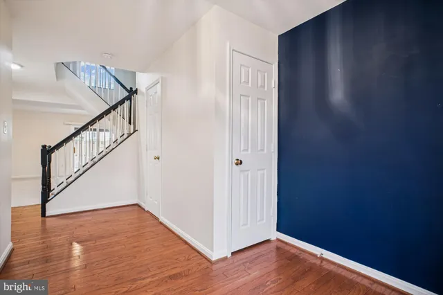 a view of entryway with wooden floor