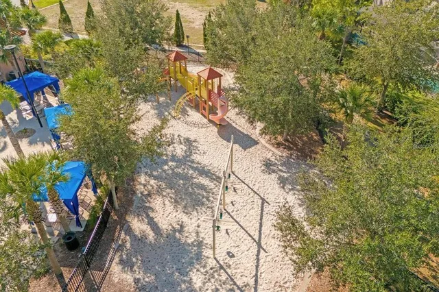 a view of a tree with an outdoor space