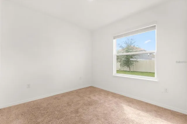 an empty room with a window
