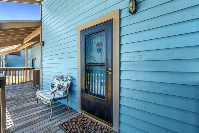 a view of a balcony with wooden floor