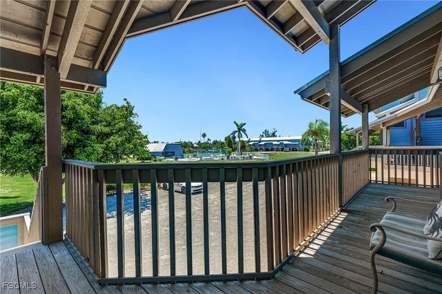 a terrace with trees in front of it