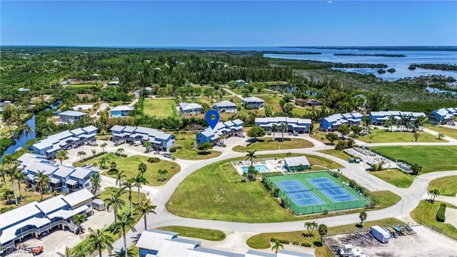 a storage utility room with sink dryer and bicycles