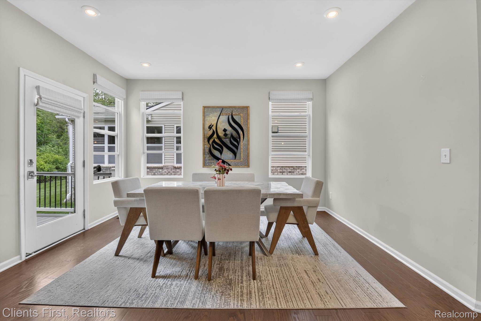 4699 Bingham Road Canton, MI 48188 - Photo 11 of 47 Dedicated dining area featuring wood-finish flooring, recessed lighting, and ample natural light from multiple windows