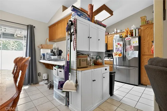 a kitchen with a sink cabinets and window