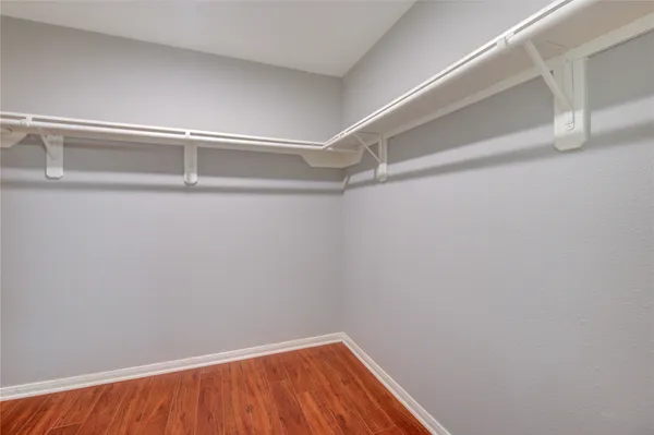 a view of a room with racks on the wall