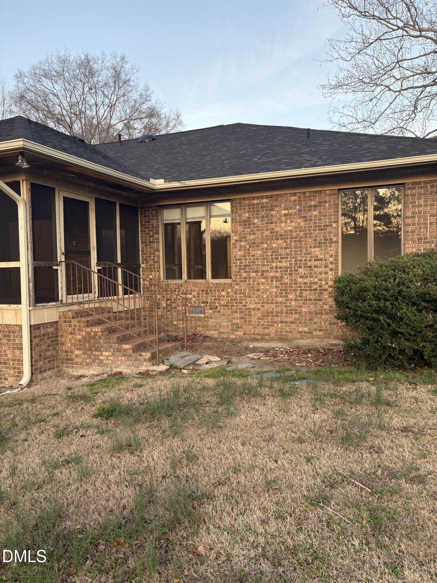 7213 Ridgefield Court Sanford, NC 27332 - Photo 15 of 17 a front view of a house with a yard
