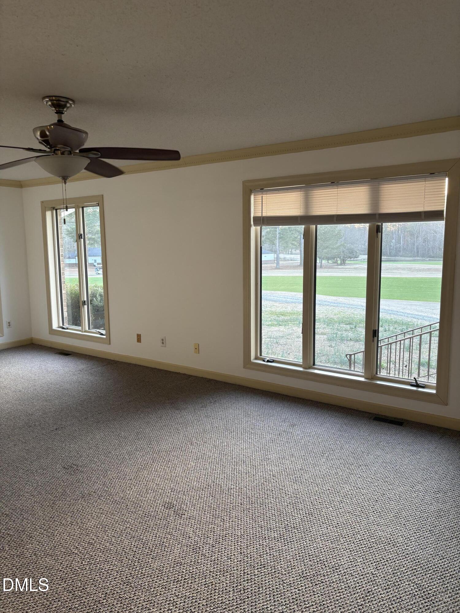 7213 Ridgefield Court Sanford, NC 27332 - Photo 3 of 17 a view of an empty room with a window