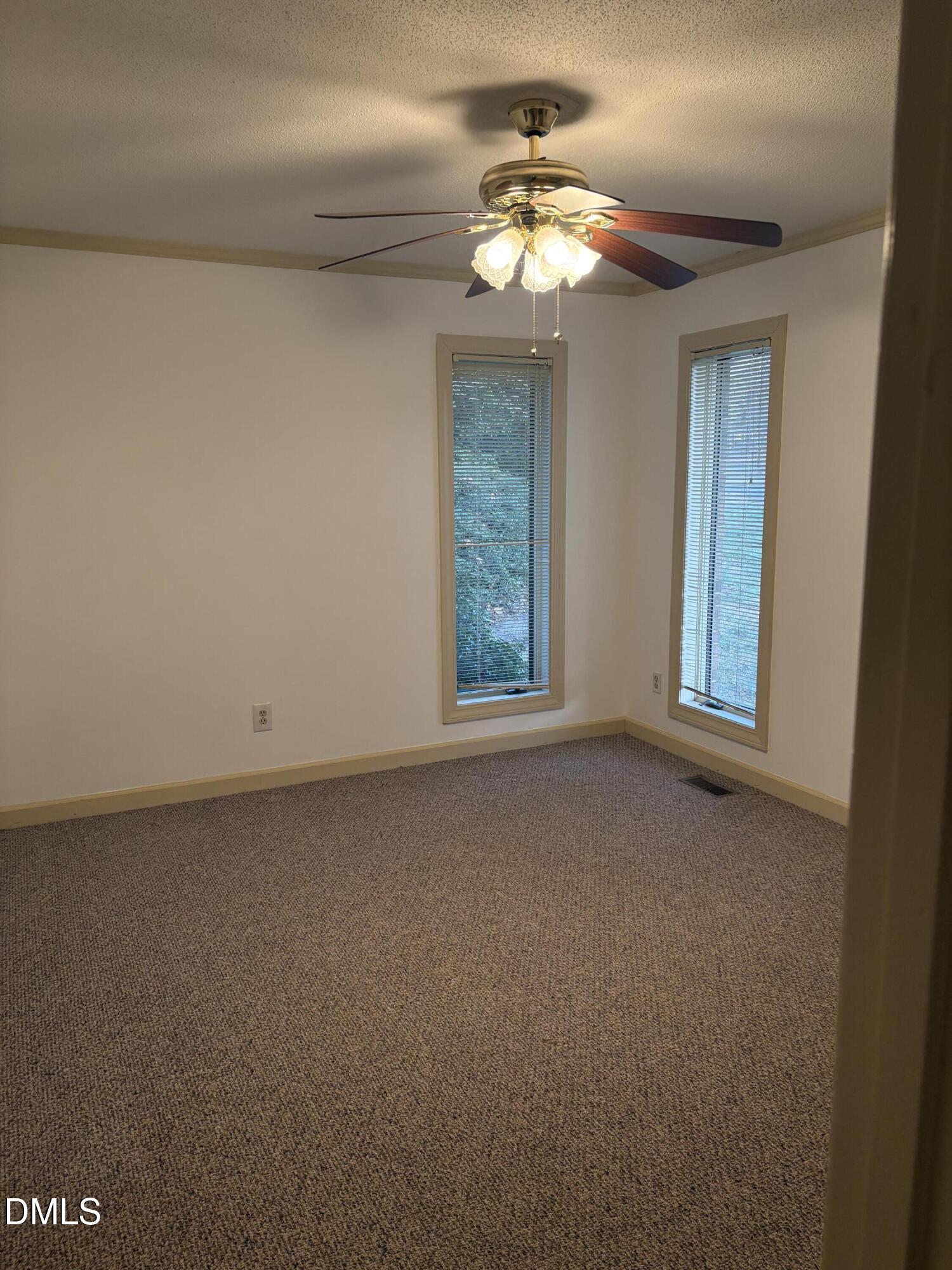 7213 Ridgefield Court Sanford, NC 27332 - Photo 9 of 17 a view of an empty room with a window