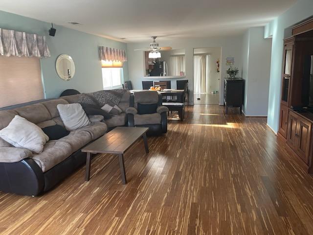 1484 Gemini Avenue Thermal, CA 92274 - Photo 11 of 26 a living room with furniture and a wooden floor