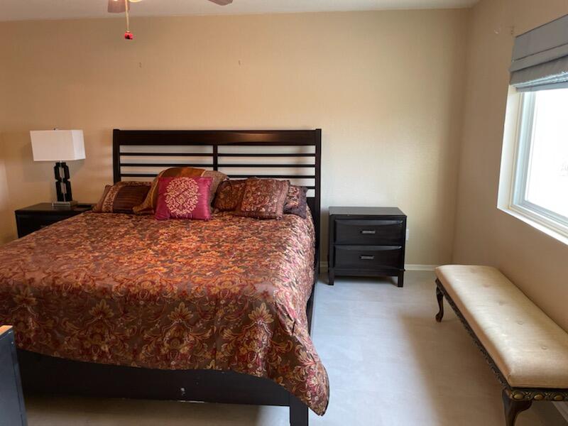 1484 Gemini Avenue Thermal, CA 92274 - Photo 13 of 26 a bedroom with a bed and window