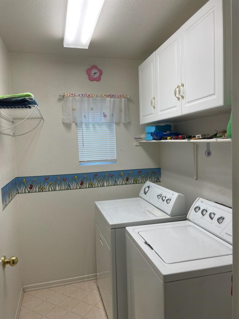 1484 Gemini Avenue Thermal, CA 92274 - Photo 21 of 26 a utility room with dryer and washer