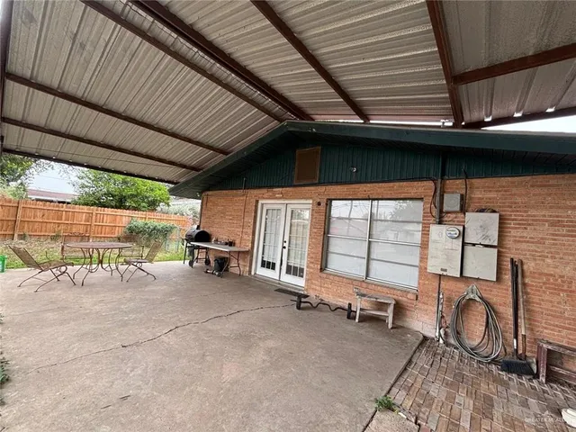 a view of a garage with chairs