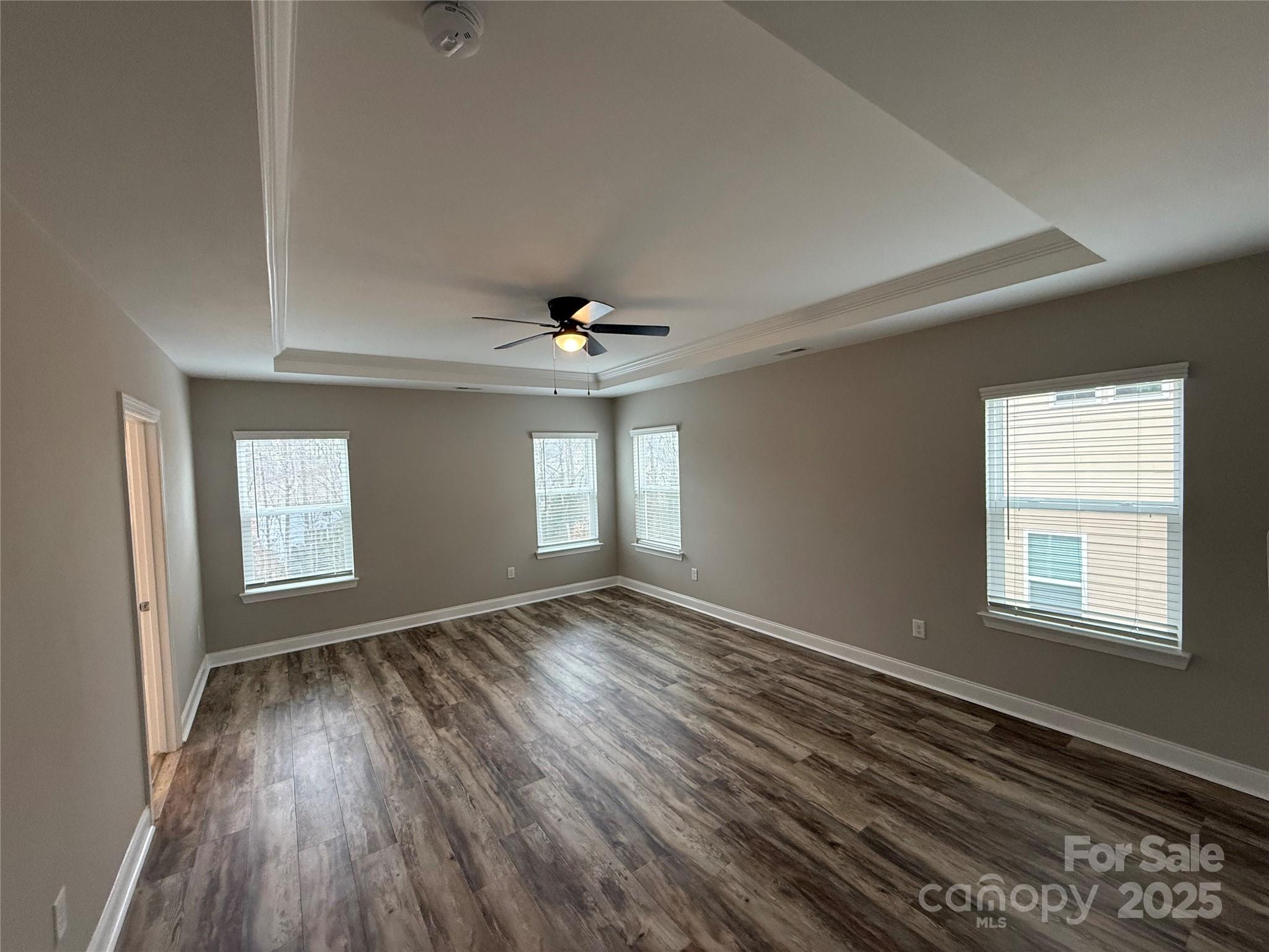 1073 Moonlight Mist Road Belmont, NC 28012 - Photo 5 of 20 a view of an empty room with wooden floor and a window