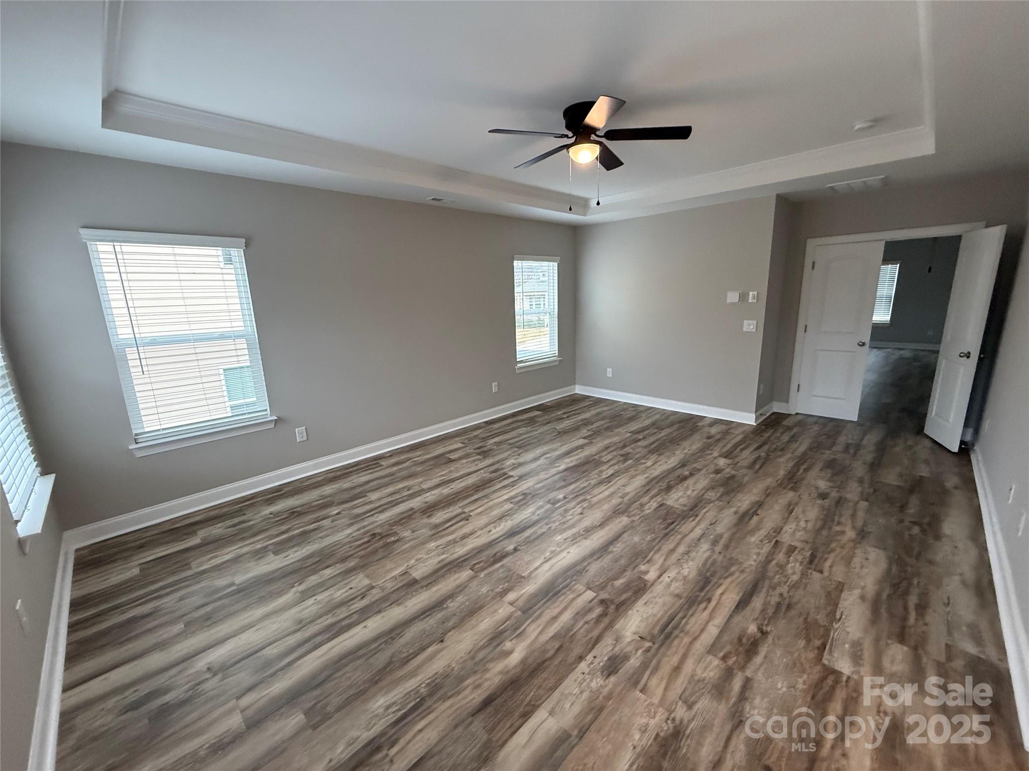 1073 Moonlight Mist Road Belmont, NC 28012 - Photo 6 of 20 a view of empty room with wooden floor and fan
