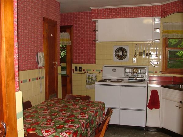 1446 Ashfield Road Conway, MA 01341 - Photo 5 of 23 a kitchen with a stove and a cabinets