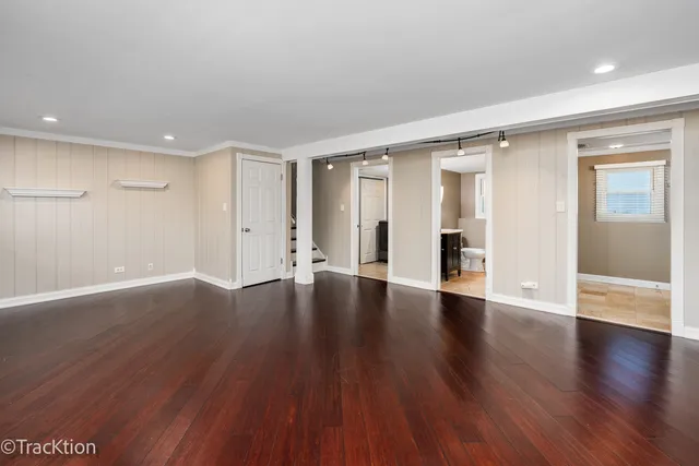 a view of a livingroom with wooden floor