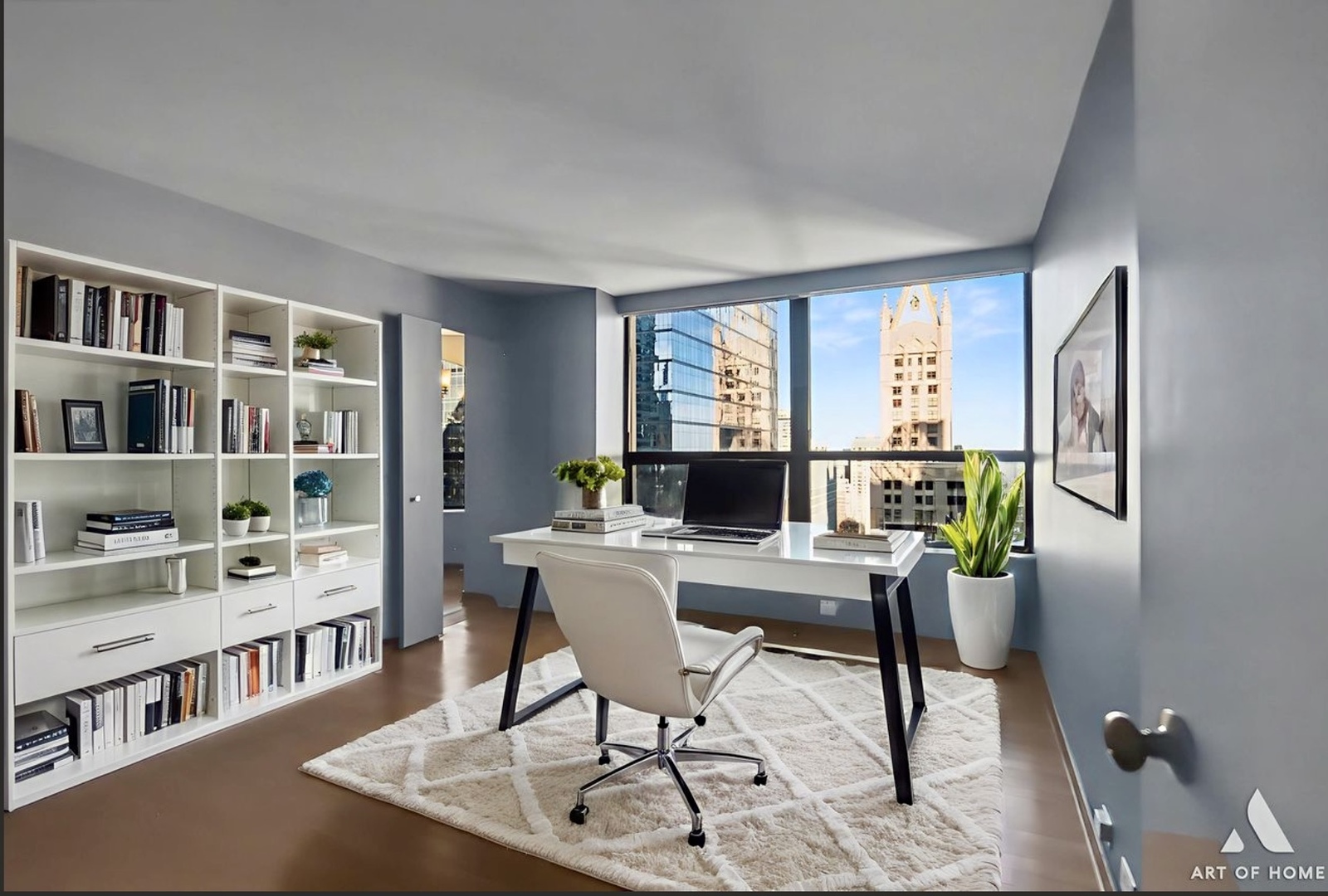 400 East Ohio Street, Unit 2902 Chicago, IL 60611 - Photo 15 of 34 a view of a workspace with furniture and a book shelf