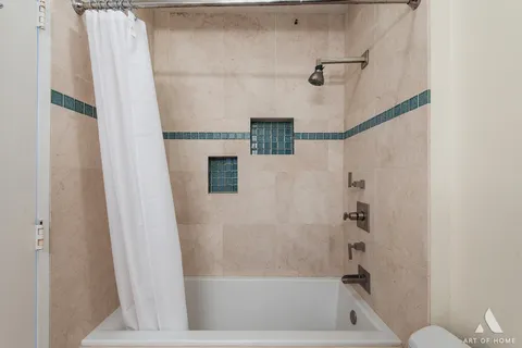 a bathroom with a bathtub