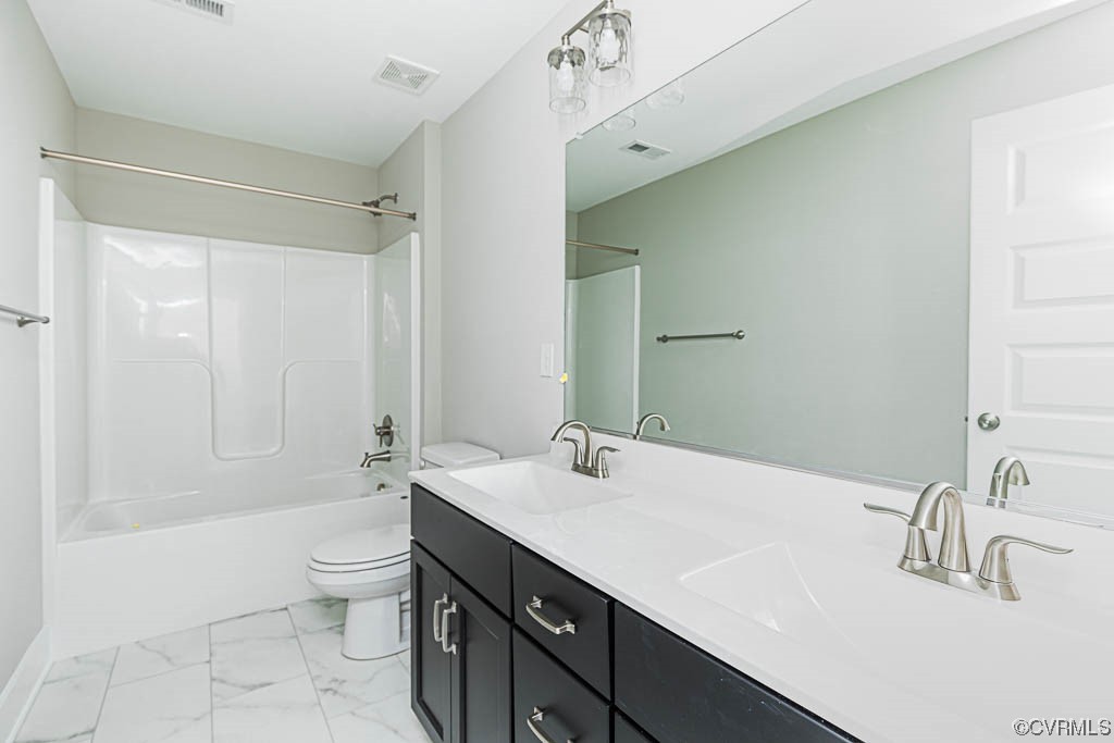 8473 Lincoln Road Mechanicsville, VA 23116 - Photo 31 of 46 a bathroom with a double vanity sink toilet and shower