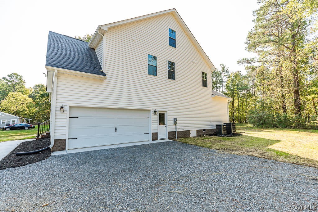 8473 Lincoln Road Mechanicsville, VA 23116 - Photo 44 of 46 a view of a house with backyard and trees