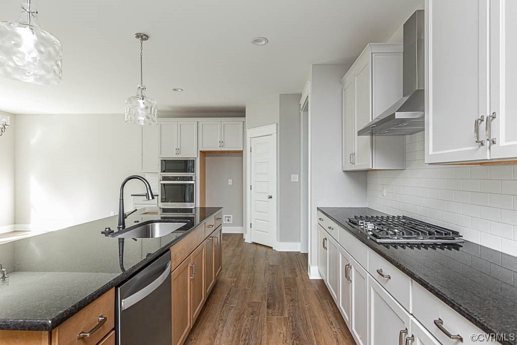 8473 Lincoln Road Mechanicsville, VA 23116 - Photo 6 of 46 a kitchen with kitchen island stainless steel appliances a sink stove top oven and refrigerator