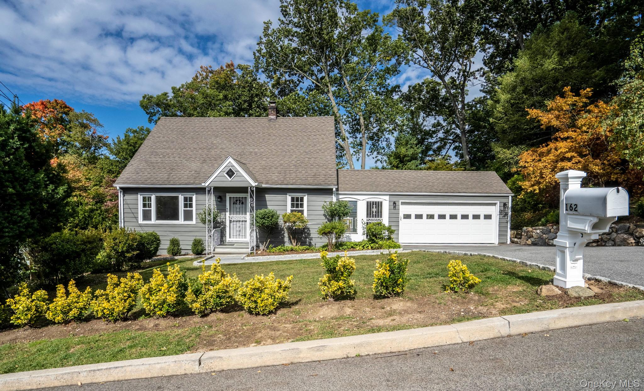 front view of a house with a patio