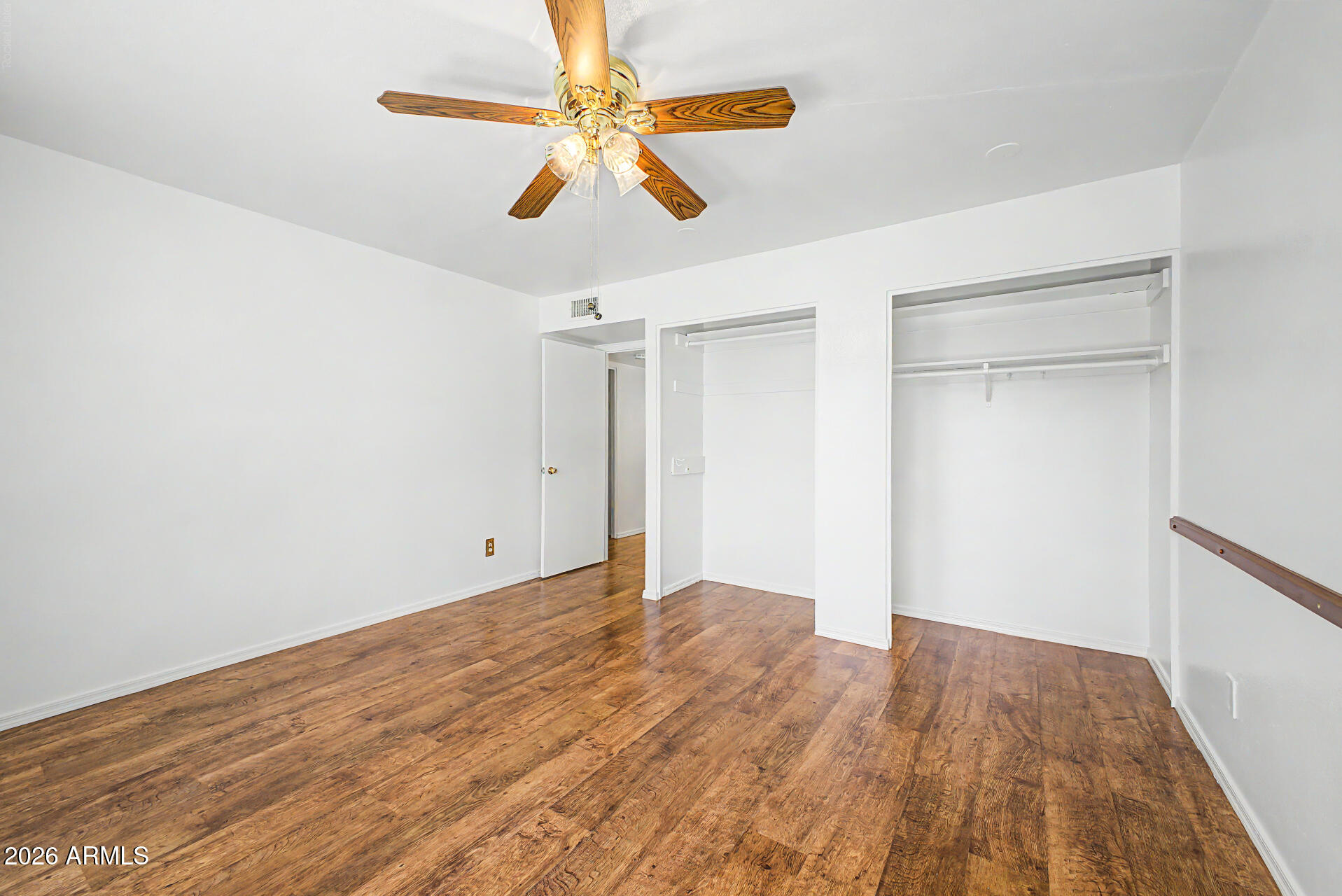 5873 East Thomas Road Scottsdale, AZ 85251 - Photo 12 of 30 a view of empty room with wooden floor