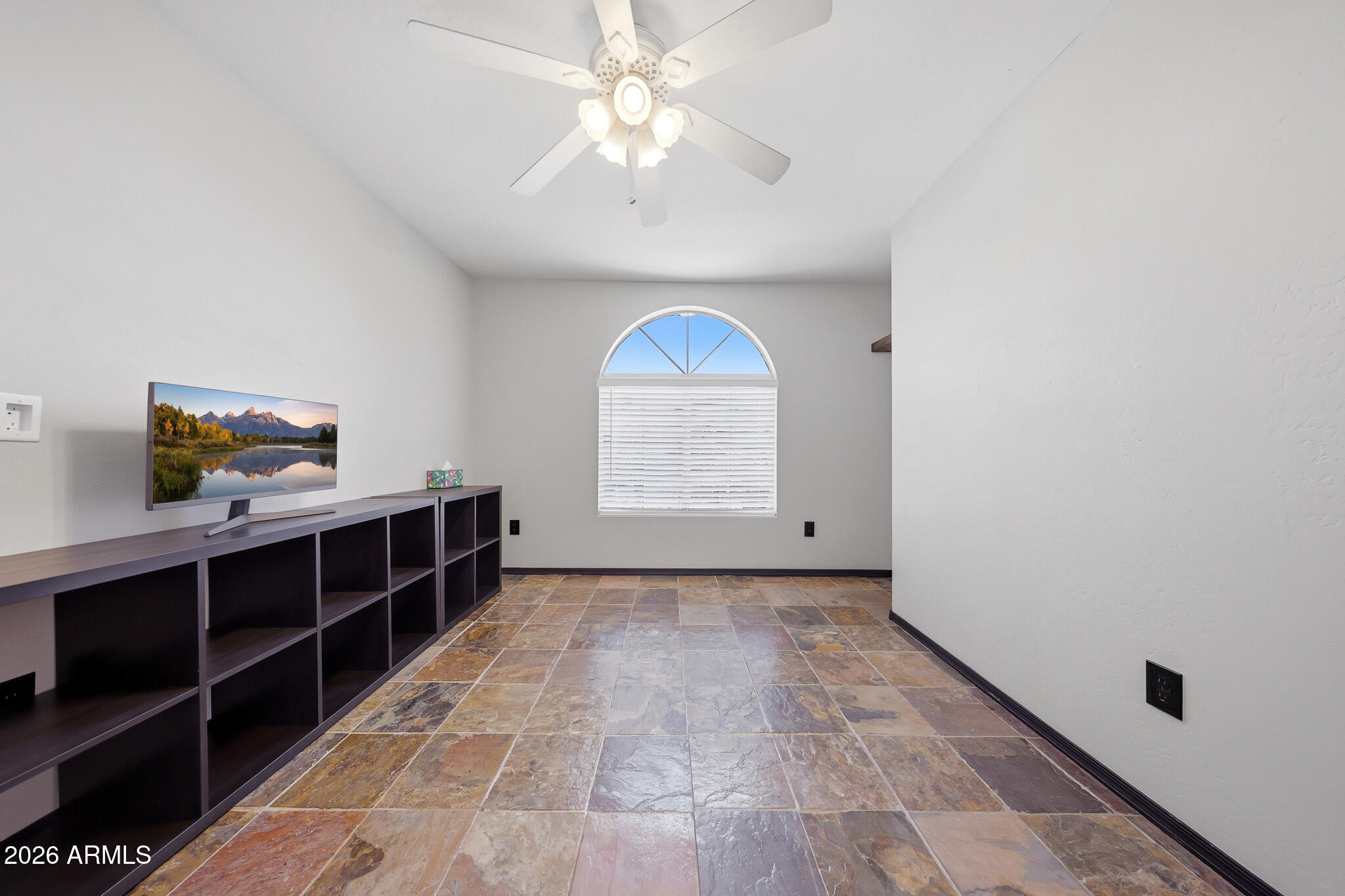 2167 East Nighthawk Way Phoenix, AZ 85048 - Photo 25 of 28 a view of a livingroom with furniture and chandelier fan